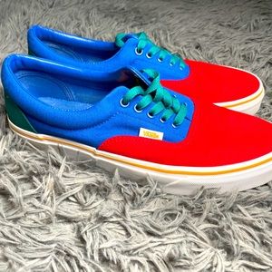 Multi colored slip on vans